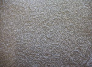 Heavy White Lace Cushion Closeup